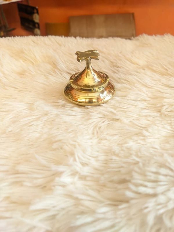 পিতলের সিঁদুরে কোঁটা