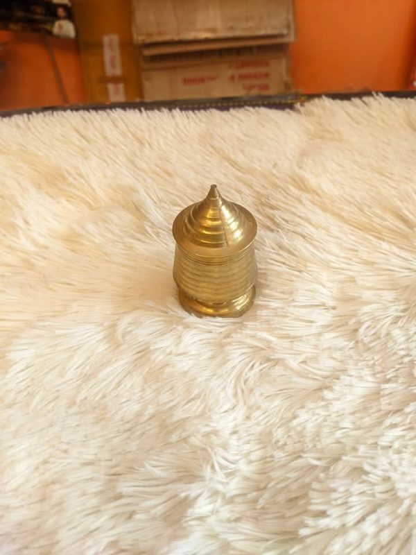 পিতলের সিঁদুরে কোঁটা